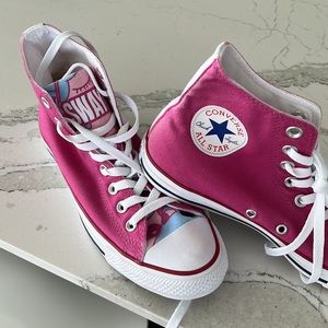Never worn pink/ magenta converse